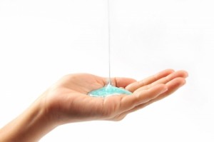 Hand with soap. Agitation and its importance for carpet cleaning E&B Carpet St Louis